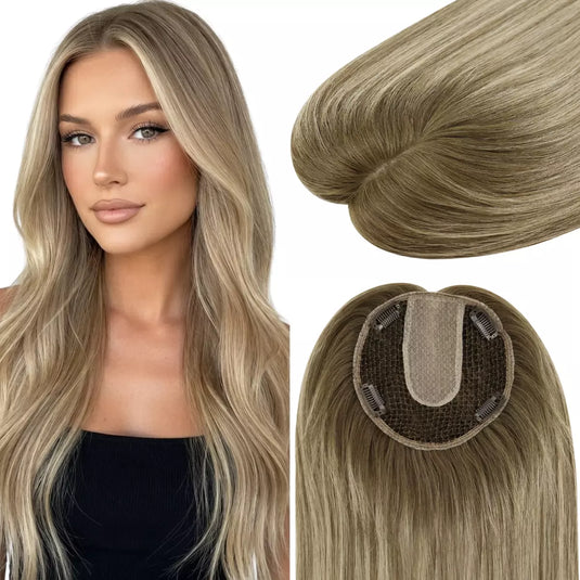 Woman with long, balayage brown hair topper on a white background