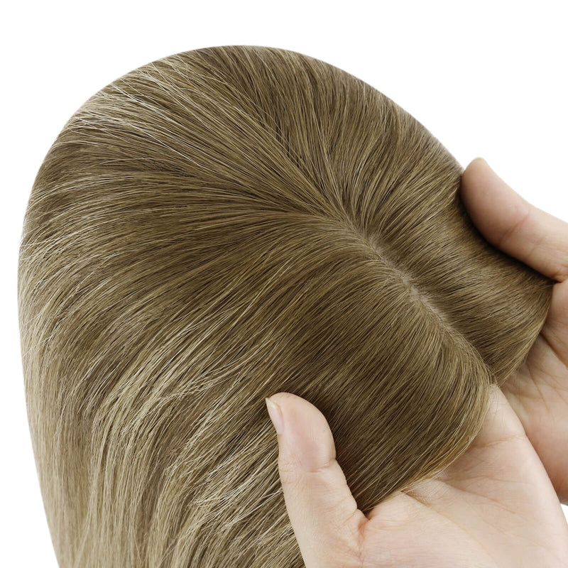 Load image into Gallery viewer, A close-up of a brown hair topper section held by hands against a plain white background, showing the texture and color of the hair.

